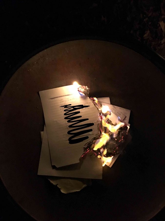 Papers burning in fire pit