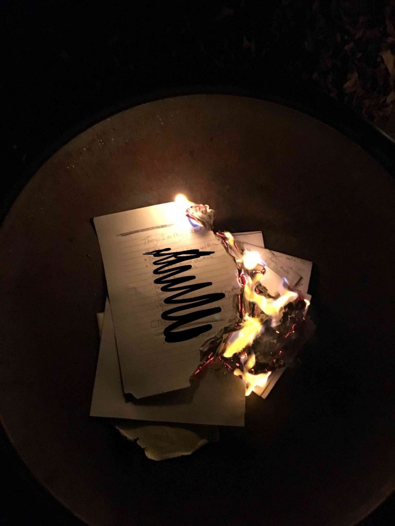 Papers burning in fire pit